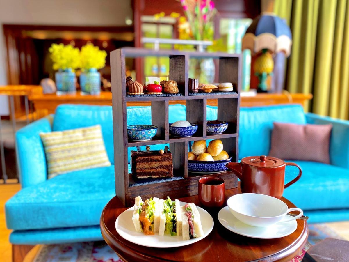 Das James Flensburg Exterior foto Afternoon tea at the Imperial Hotel, Hanoi, Vietnam